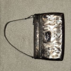 Metallic silver Michael Kors Wristlet
